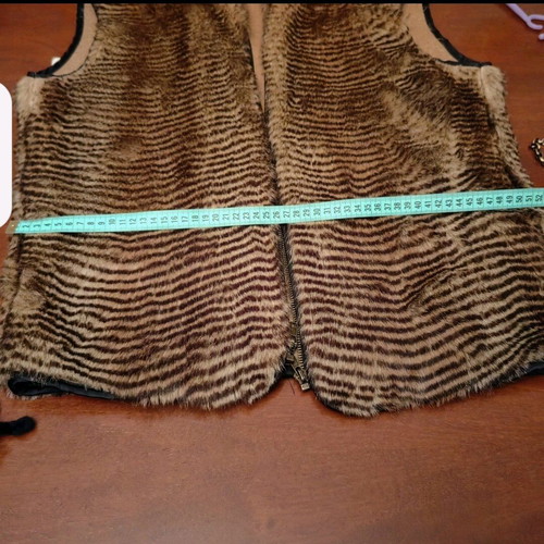 Synthetic fur vest brown like new with decorative zipper