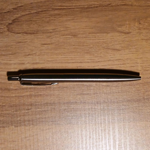 Metal pen silver color new with black ink
