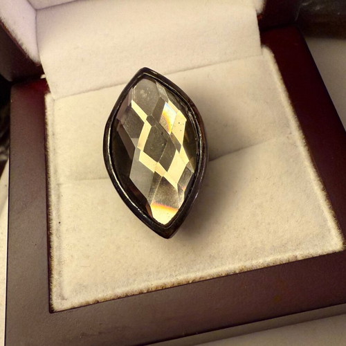 Faux ring used, shiny faux glass, anthracite metal base, adjustable size