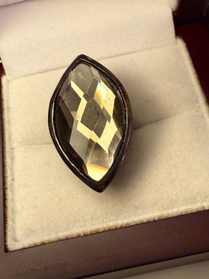 Faux ring used, shiny faux glass, anthracite metal base, adjustable size