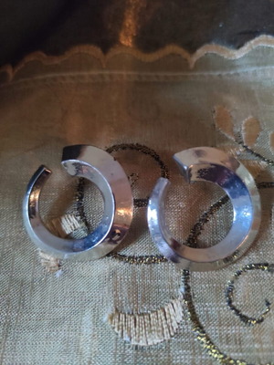 Silver earrings used for pierced ears, steel