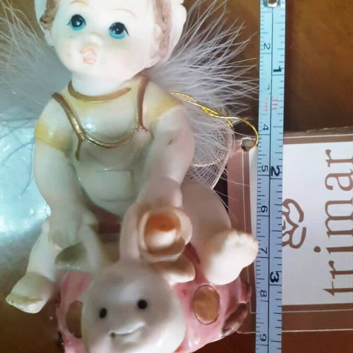 Vintage porcelain figurine Trimar baby angel on snail, like new