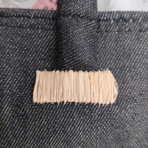 Denim shoulder bag with straw details