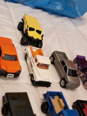 Hot Wheels toy trucks and cars like new