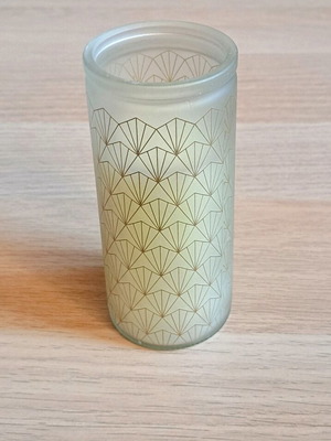 White candle in container new