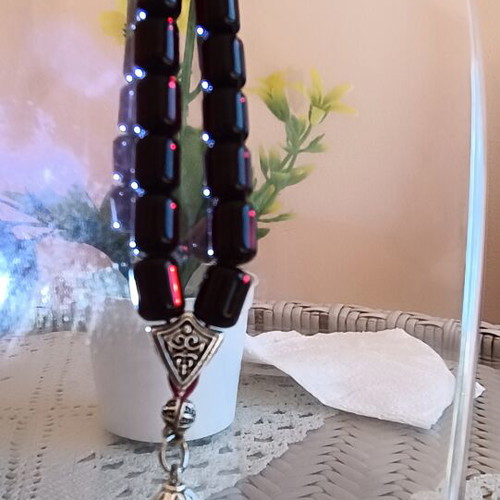 Komboloi worry beads, 33 black cherry mastic beads