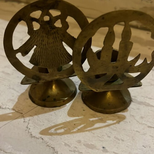 Set of 5 used bronze candlesticks