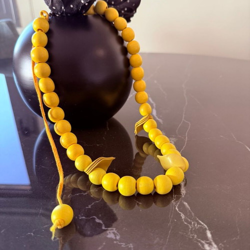 Handmade yellow necklace with wooden beads and suede cord like new