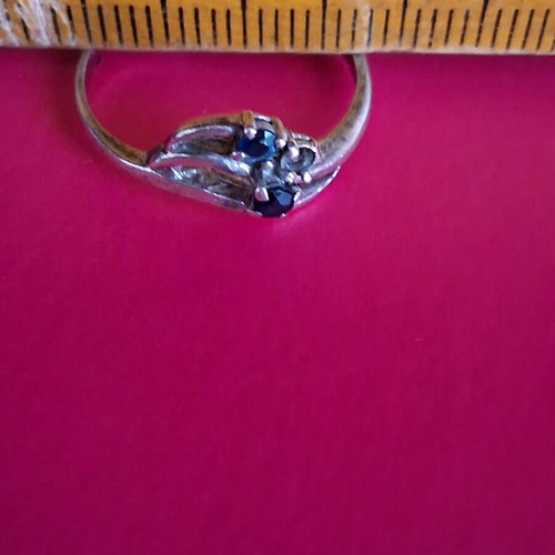 Silver 925 ring used, missing one stone