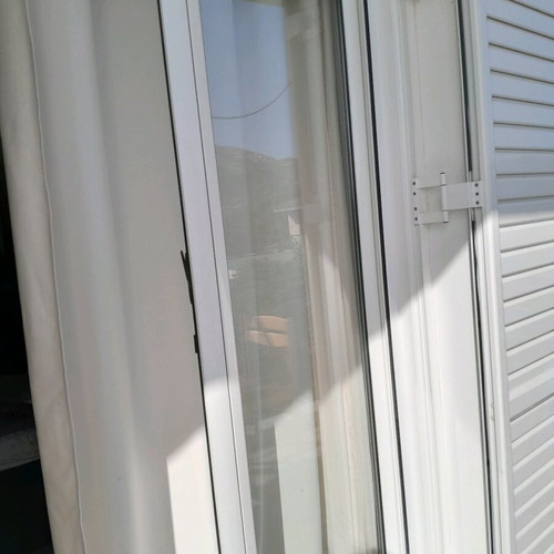 Balcony door like new 225×130 with glass and shutters