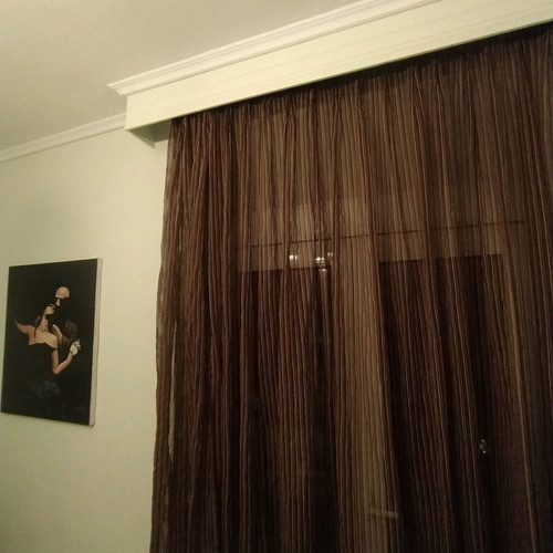 Curtain for window in dark brown shades with beige stripes like new