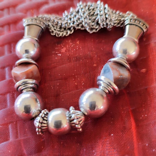 Silver-plated bracelet like new with genuine brown stones and elastic