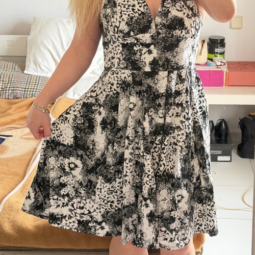 Vintage women's midi dress with halter neckline and black and white floral pattern used