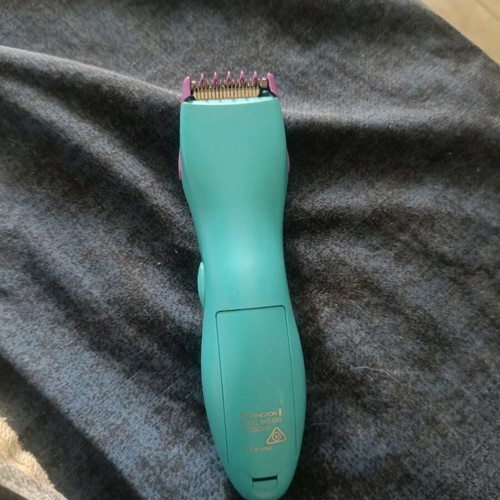 Remington trimmer machine like new with built-in guards