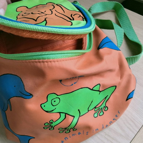 Backpack with ecological label like new, green and orange