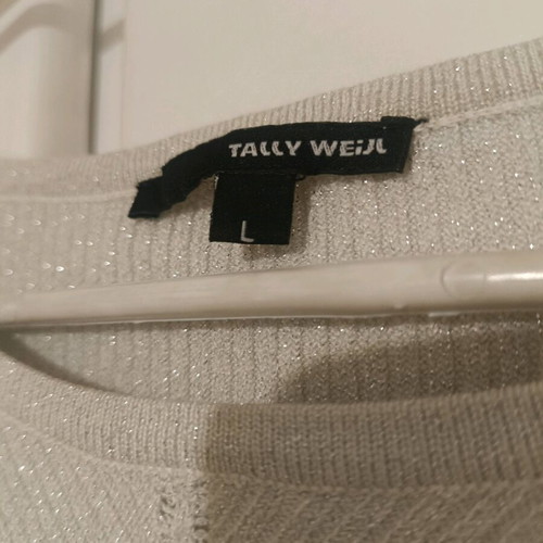 Women's knitted white blouse with metallic thread like new, size L