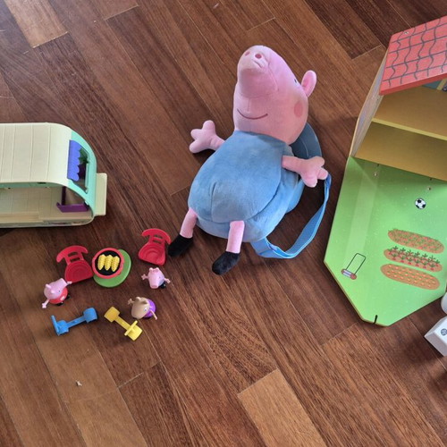 Peppa the Pig toys used with caravan, wooden house and George bag
