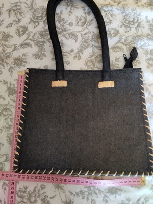 Denim shoulder bag with straw details
