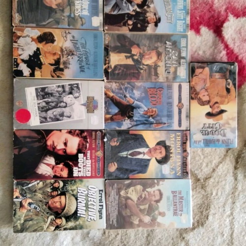 Set of 11 authentic VHS tapes with classic adventure movies like new