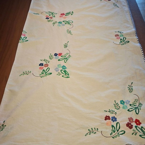 Vintage handmade embroidered tablecloth with flowers and needlework