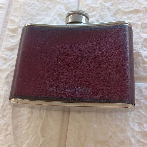 Flask with leather cover like new, 6 oz capacity