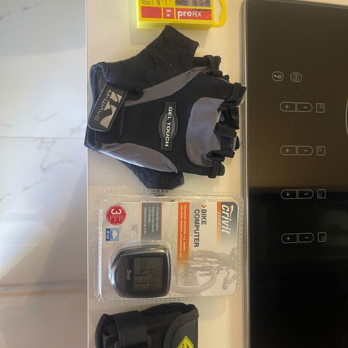 Bicycle accessory set new with Muddyfox gloves, Crivit bike computer, Road Sign tools and reflectors