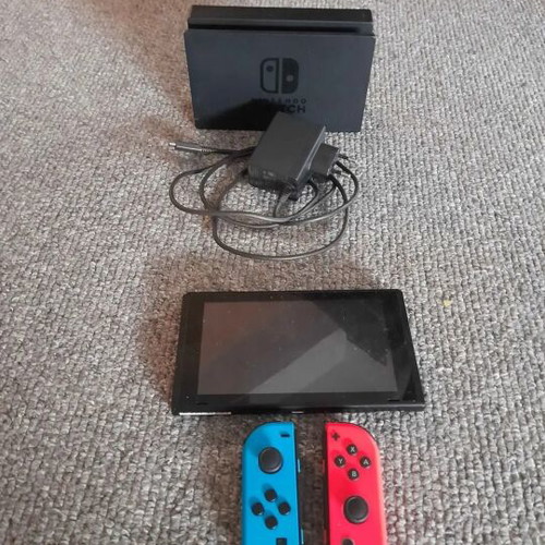 Nintendo Switch 128 GB like new with dock, charger and games