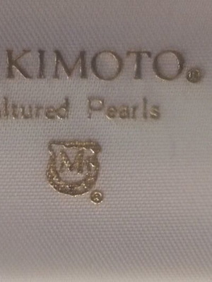 Authentic Mikimoto pearl box and booklet like new