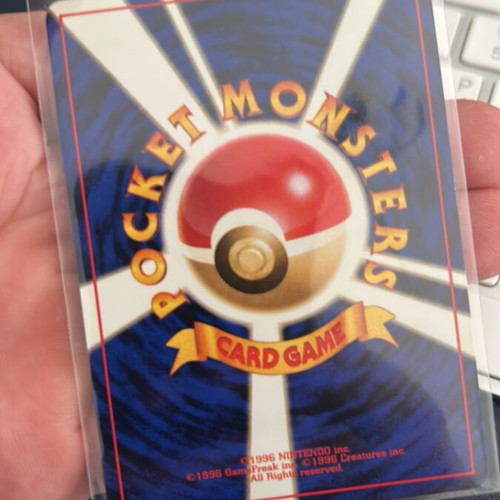 Machoke Team Rocket Pokemon Card used, moderately played