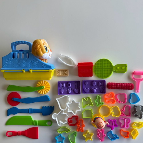 Play Doh Care and Carry Vet Playset used with modeling accessories