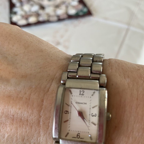 Coach women's watch with stainless steel bracelet like new