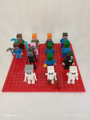 Ninjago and Minecraft figures set of 7 like new with weapons