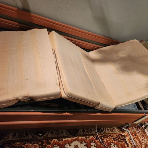 Electric hospital bed used with headboard