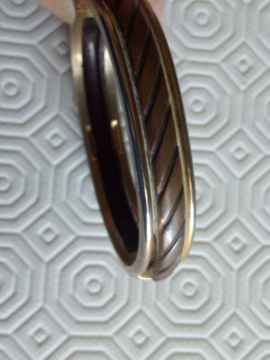 Bracelet handcuff used, brown and gold