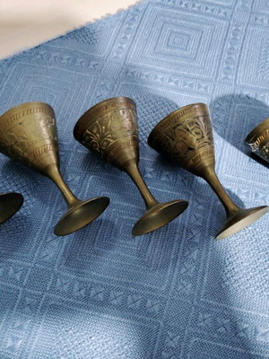Bronze liqueur glasses used, set of five, old carved