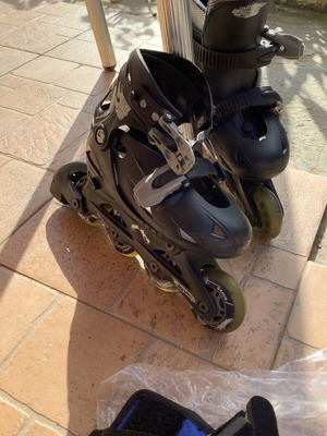 Rollers for boys used, adjustable sizes 30-33 with accessories