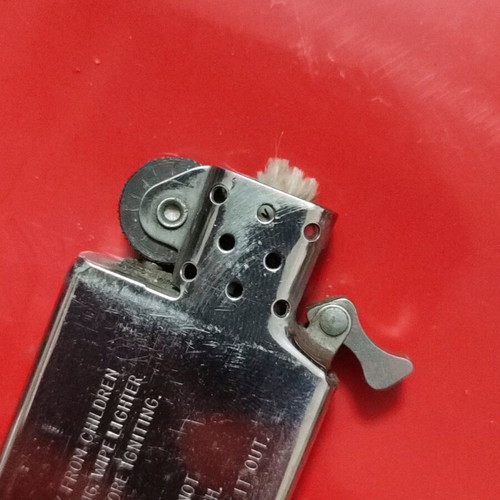 Slim Zippo lighter used, collectible (1989)