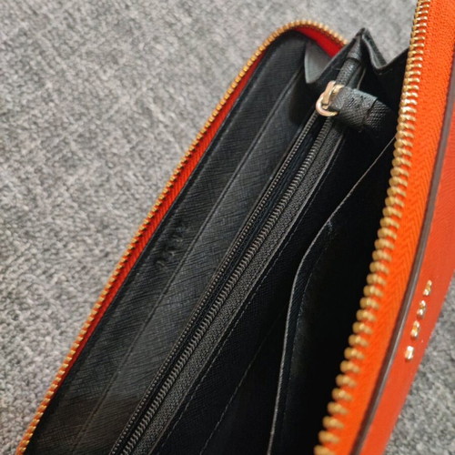 DKNY leather wallet like new, red orange