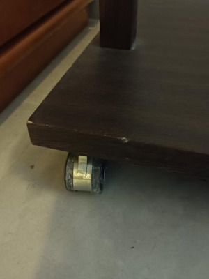 Glass coffee table with wheels used