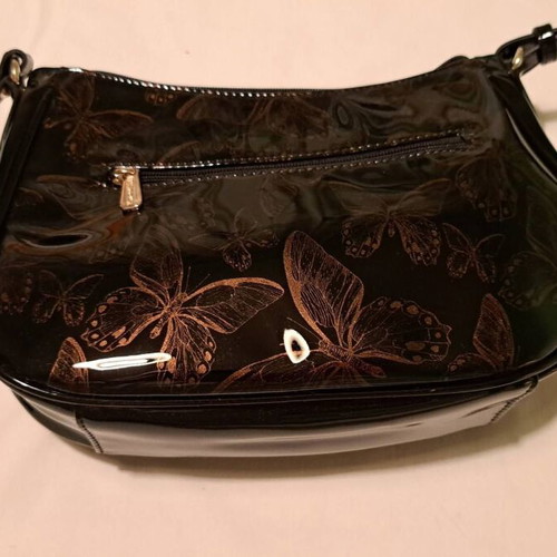 Hexagona black patent leather shoulder bag with gold butterfly pattern