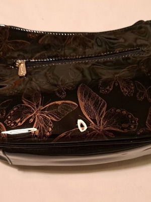 Hexagona black patent leather shoulder bag with gold butterfly pattern