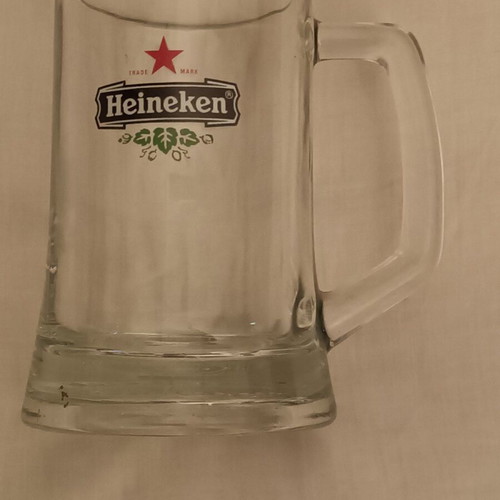 Collectible glass promotional Hineken mug like new