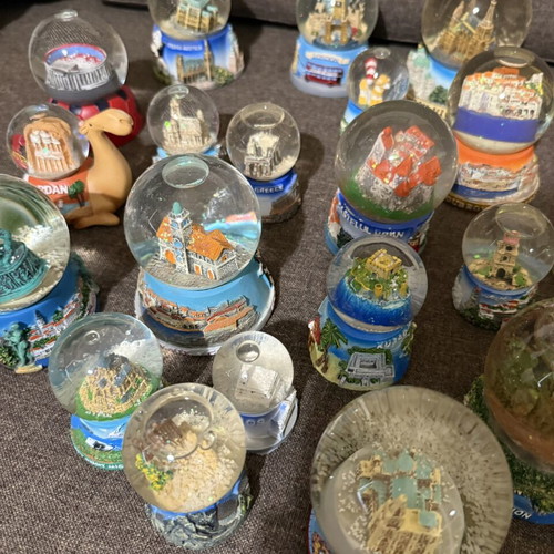 Tourist souvenir snow globes new from various world and Greek locations