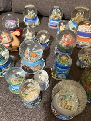 Tourist souvenir snow globes new from various world and Greek locations