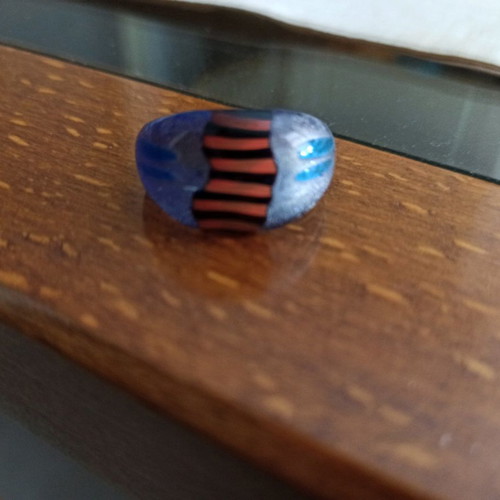 Murano ring like new with blue, orange and black colors and silver leaf