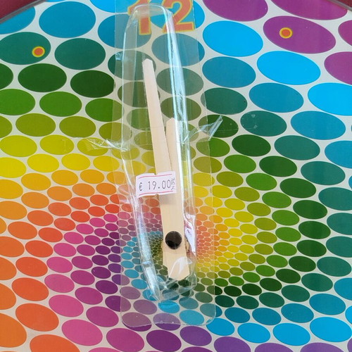 Glass pop art wall clock with spiral design and vibrant colors