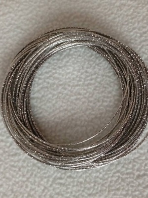 Metal bracelet silver tone like new, multiple thin strands