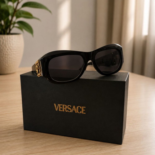 Versace collectible sunglasses, black lenses and frame