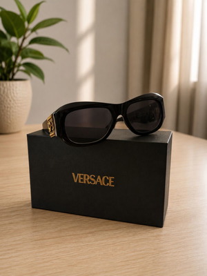 Versace collectible sunglasses, black lenses and frame