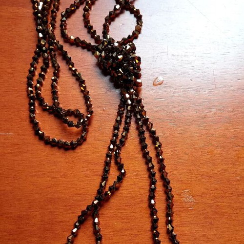 Lariat Necklace like new with brown crystal beads